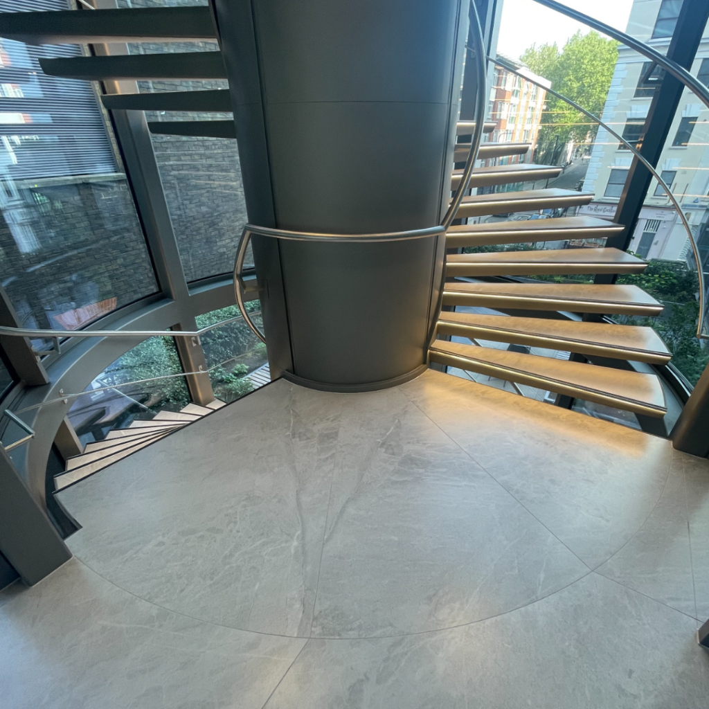 London spiral staircase installation Showcase photograph spectrum stone and ceramic 